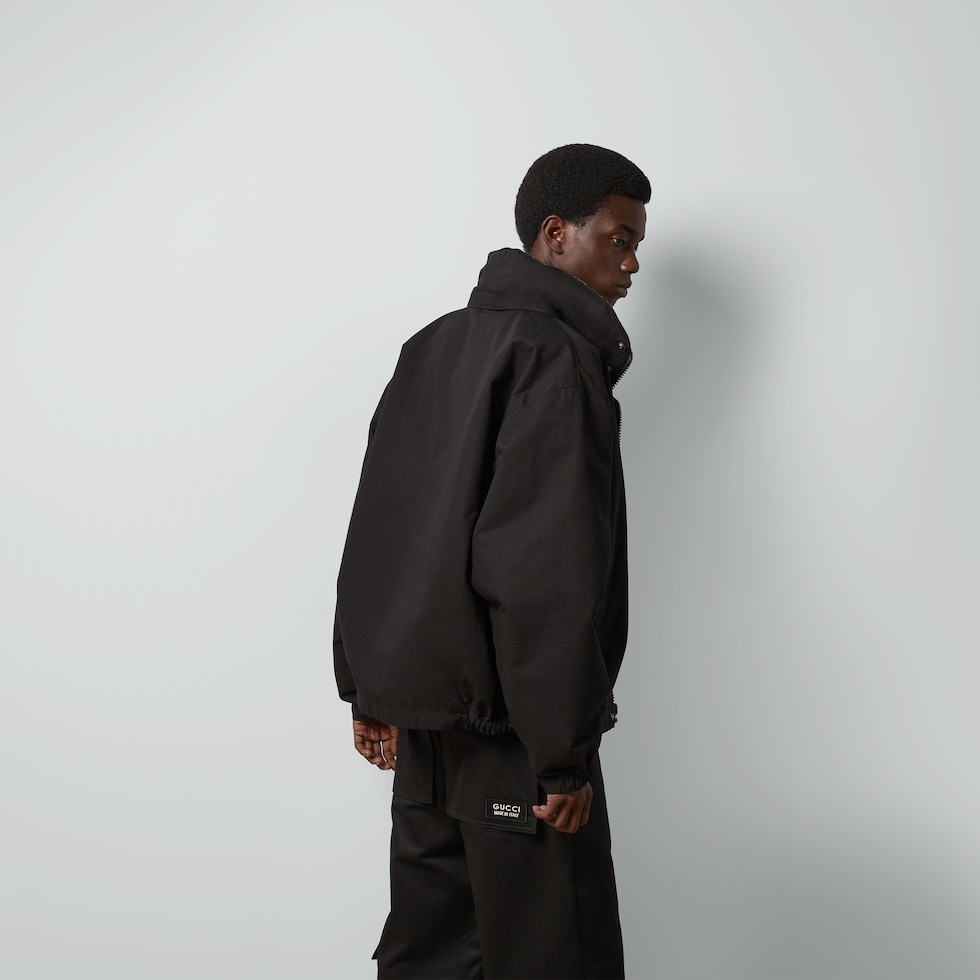 Reversible GG ripstop nylon jacket in black and grey | GUCCI® US
