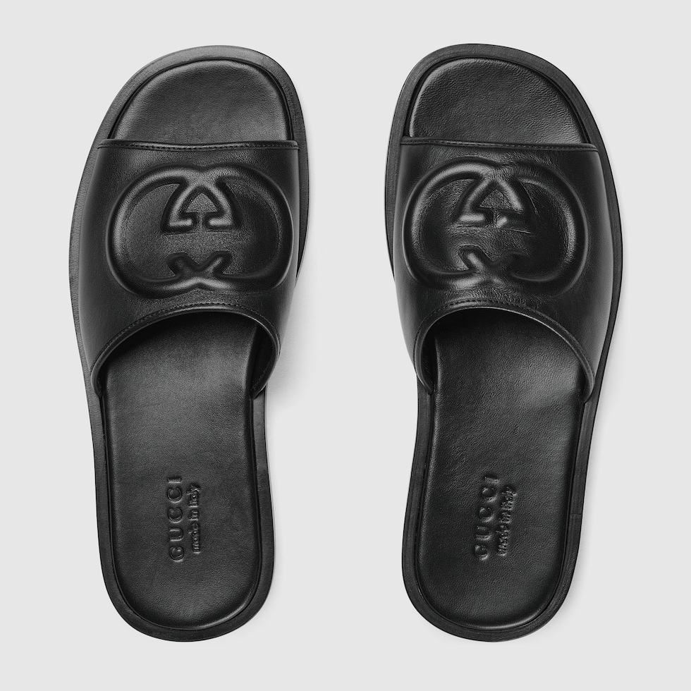 Men s slide sandal with Interlocking G in black leather GUCCI Canada