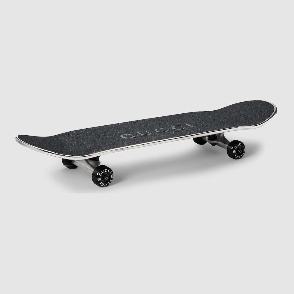 Gucci logo skateboard in black wood | GUCCI® US
