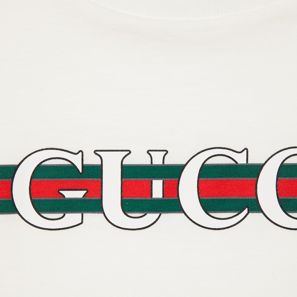 Tシャツ・カットソー GUCCI Logo Printed T-Shirt Printed cotton jersey T-shirt in navy | GUCCI® US