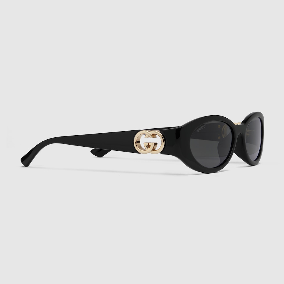 Oval frame sunglasses in black | GUCCI® US