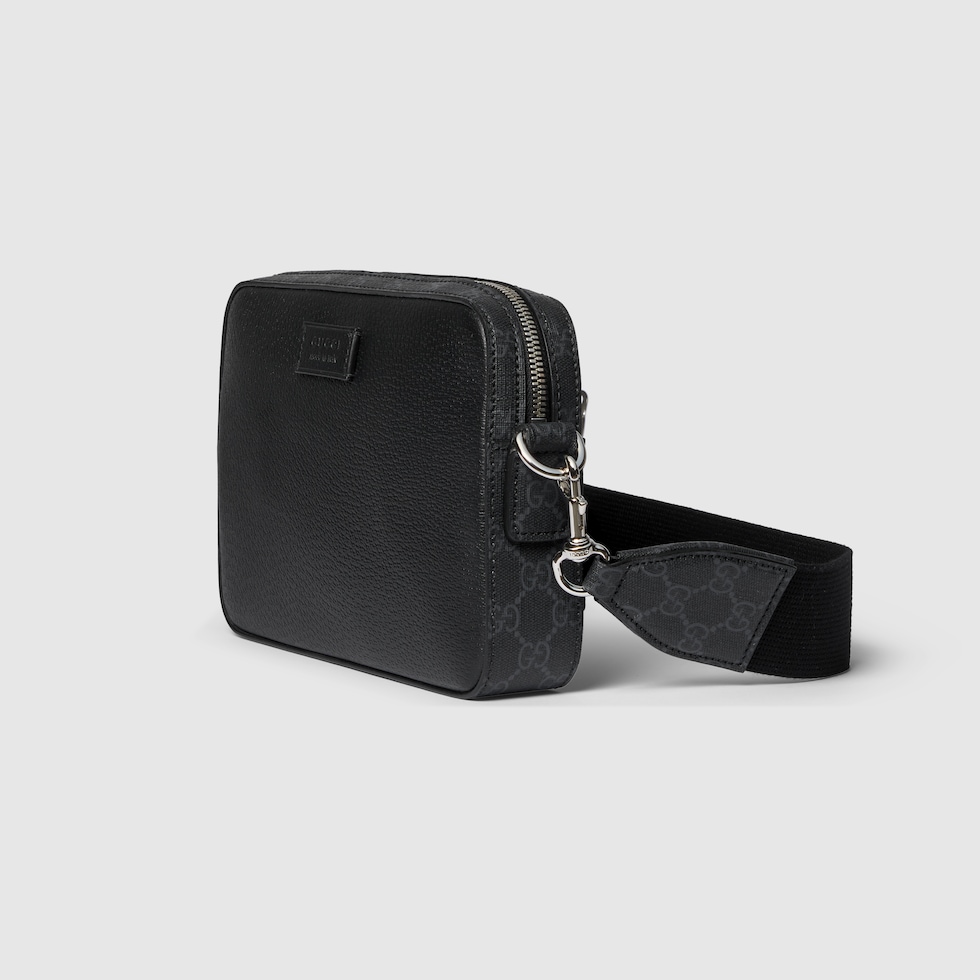 Small GG crossbody bag with tag in black leather | GUCCI® US