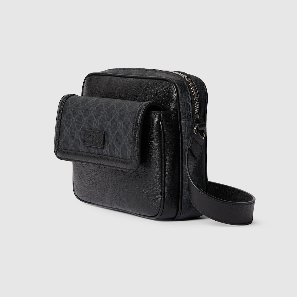 Small GG crossbody bag with tag in black leather | GUCCI® US