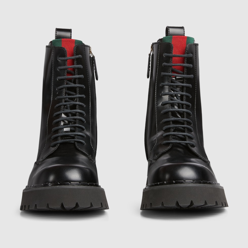 Stivale uomo con dettaglio Web in pelle nera GUCCI Italia