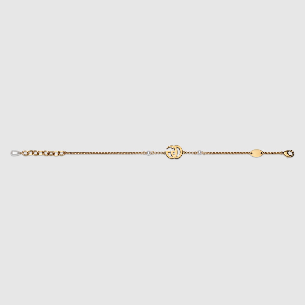 GG Marmont chain bracelet with charm in yellow gold-toned metal