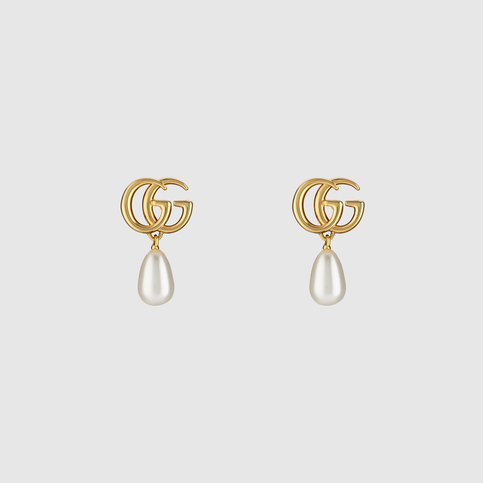 GG Marmont pearl drop earrings in yellow gold-toned metal