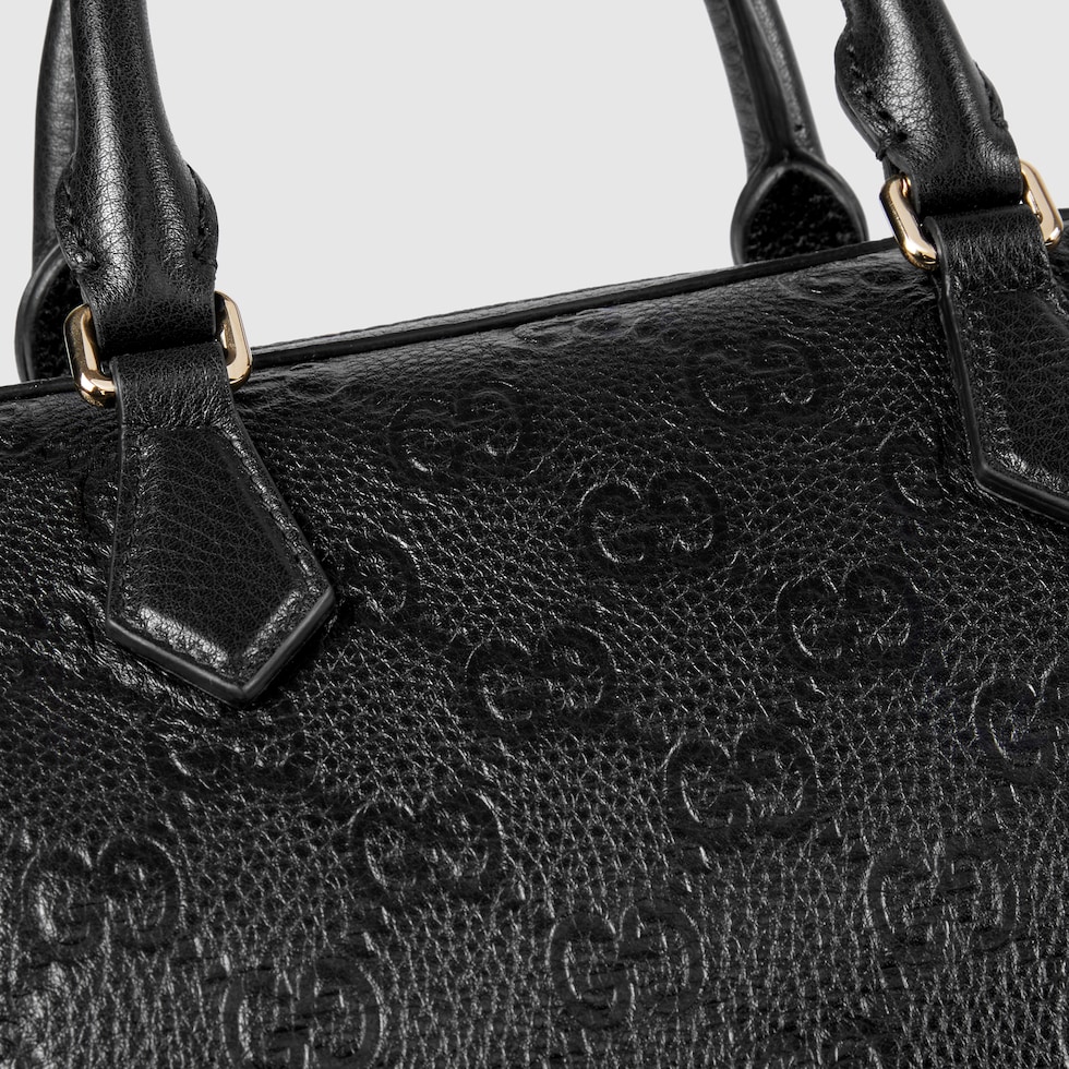 GG Emblem small top handle bag in black GG leather | GUCCI® US GG Emblem small top handle bag in black GG leather | GUCCI® US