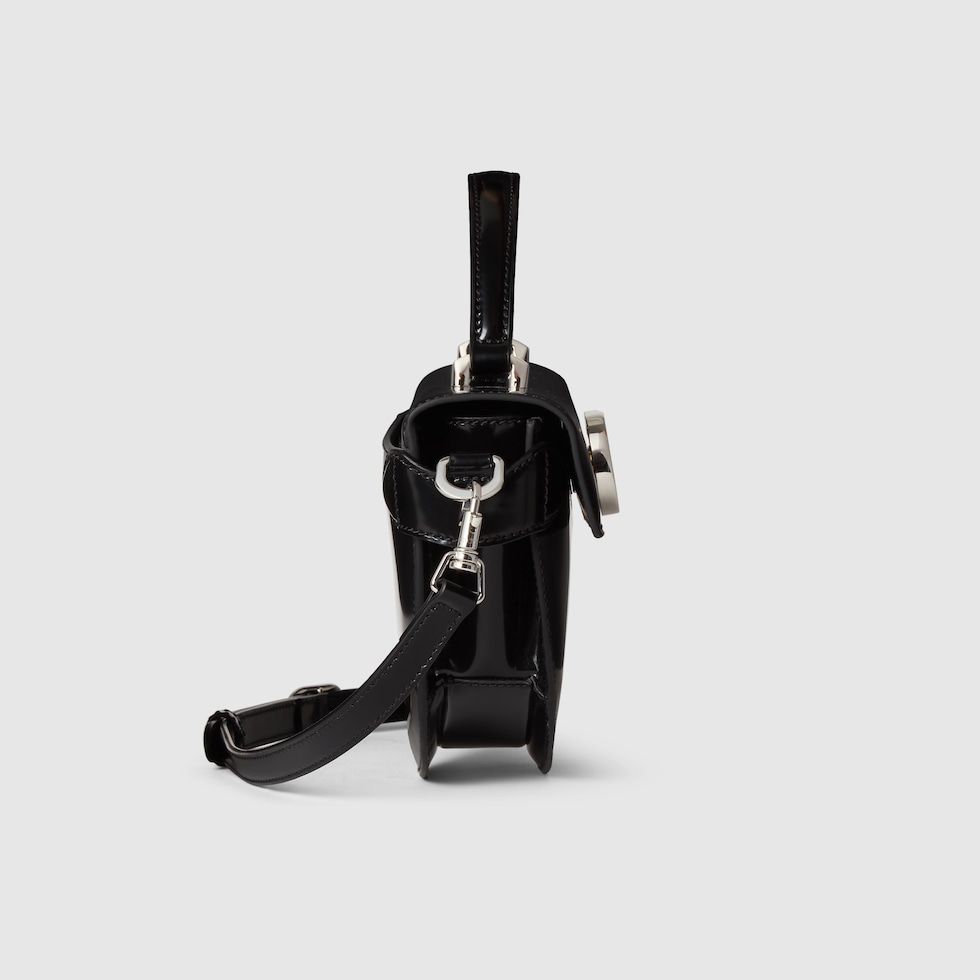 Small halfmoon top handle bag in black leather GUCCI® TR