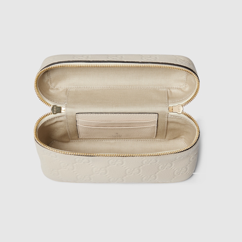 GG Emblem small bag in ivory leather | GUCCI® US