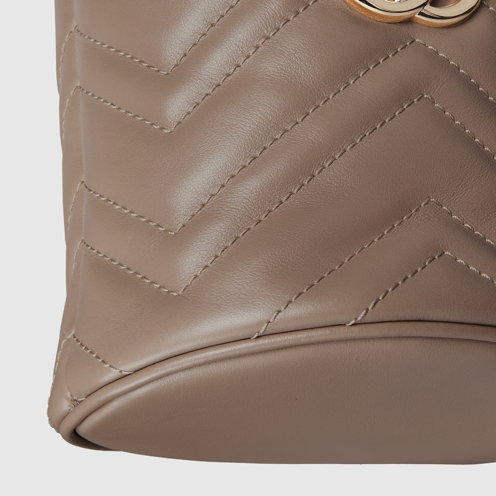 GG Marmont mini bucket bag in taupe leather | GUCCI® US