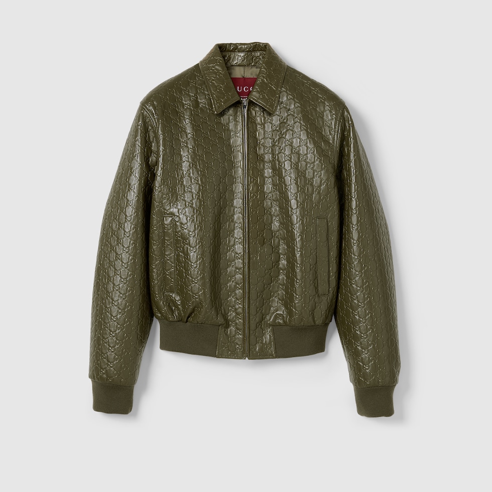 GG embossed leather bomber jacket in dark green | GUCCI® SI