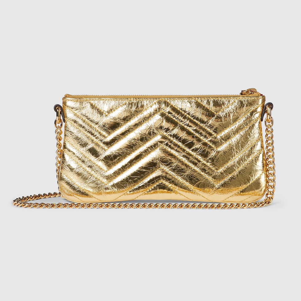GG Marmont pochette with chain in gold leather | GUCCI® US