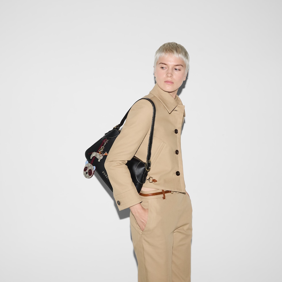 GG Emblem medium shoulder bag in black leather | GUCCI® US