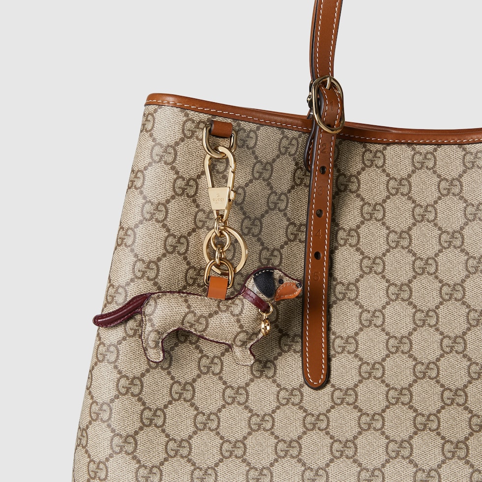 Dog shaped bag charm in beige and dark brown canvas GUCCI Canada