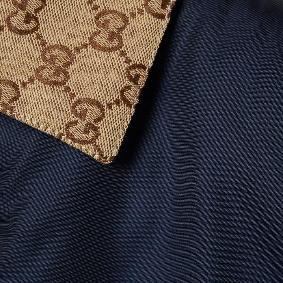 Reversible gabardine nylon jacket in dark blue | GUCCI® US