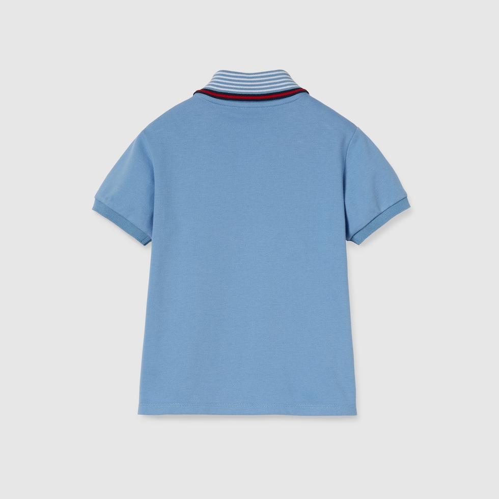 Children's cotton polo shirt with embroidery in light blue
