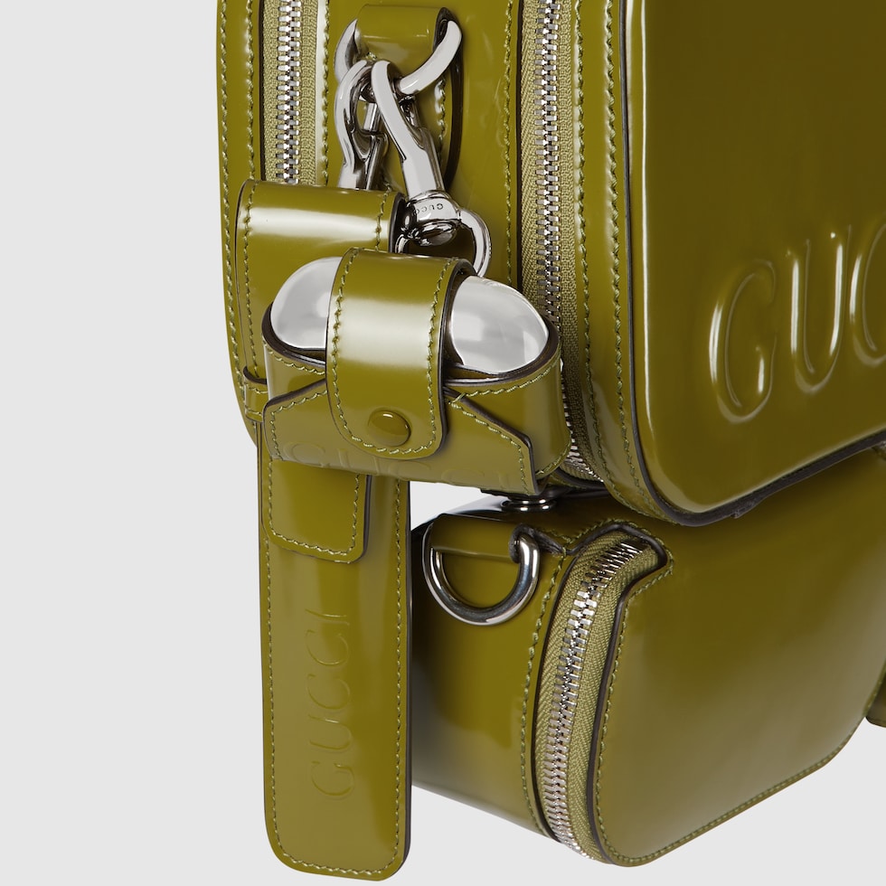 Holder for AirPods with logo in olive green leather | GUCCI® US