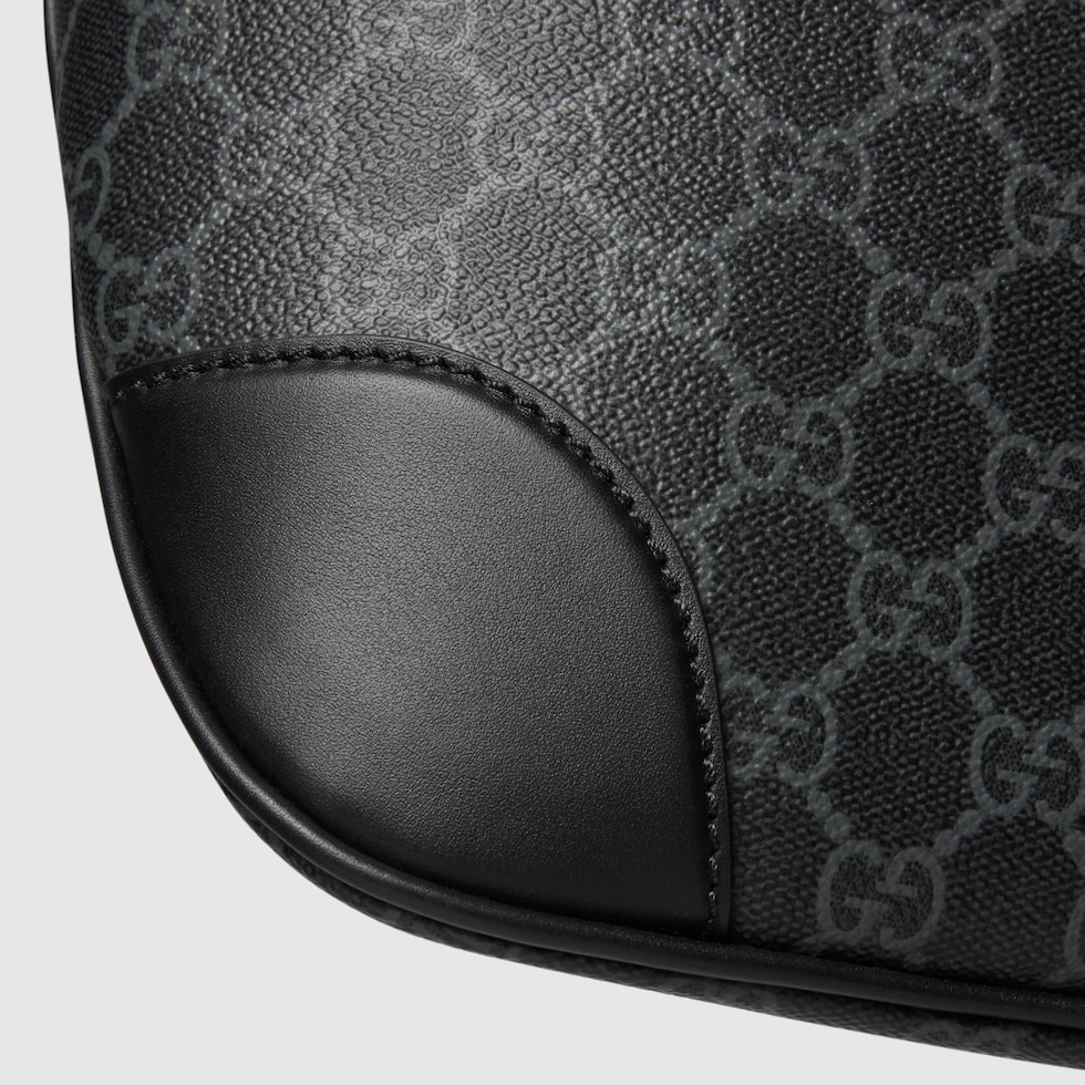 GG Emblem medium belt bag in black fabric | GUCCI® Canada