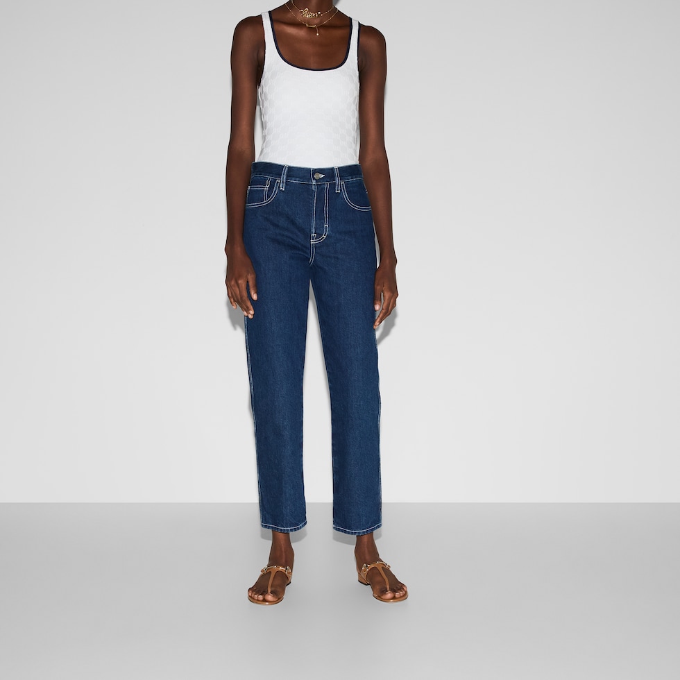 Slim cropped fit lasered denim pants in blue | GUCCI® US