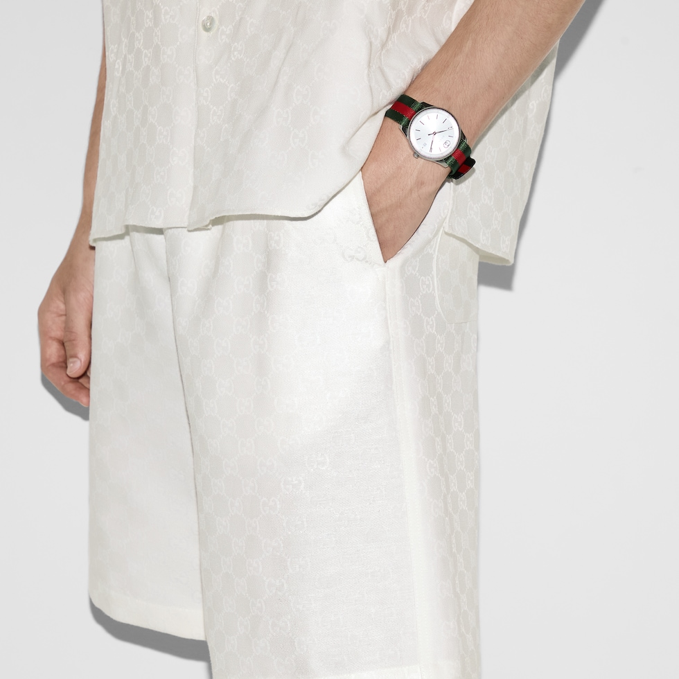 Linen blend GG canvas shorts in white | GUCCI® US Linen blend GG canvas shorts in white | GUCCI® US