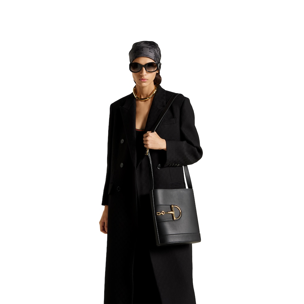 Gucci 73 medium bucket bag in black leather | GUCCI® US Gucci 73 medium bucket bag in black leather | GUCCI® US