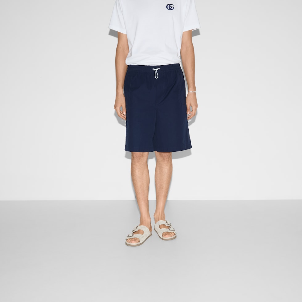 ショートパンツ GUCCI BLUE COTTON SHORTS Striped cotton shorts with embroidery in light blue | GUCCI® US