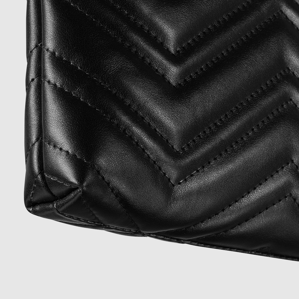 GG Marmont pochette with chain in black leather | GUCCI® US