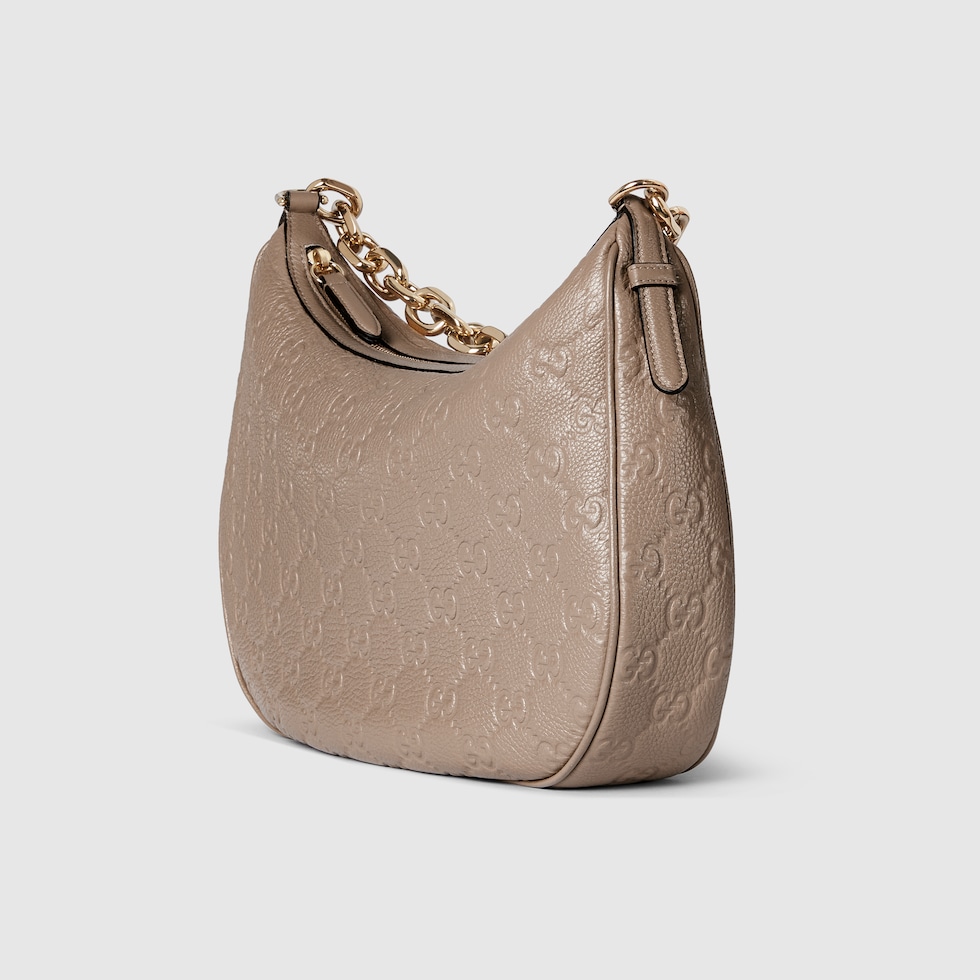GG Emblem large shoulder bag in taupe GG leather | GUCCI® US