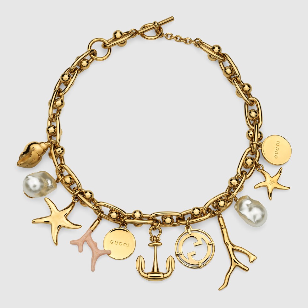 Chain necklace with Gucci symbols in yellow gold-toned brass