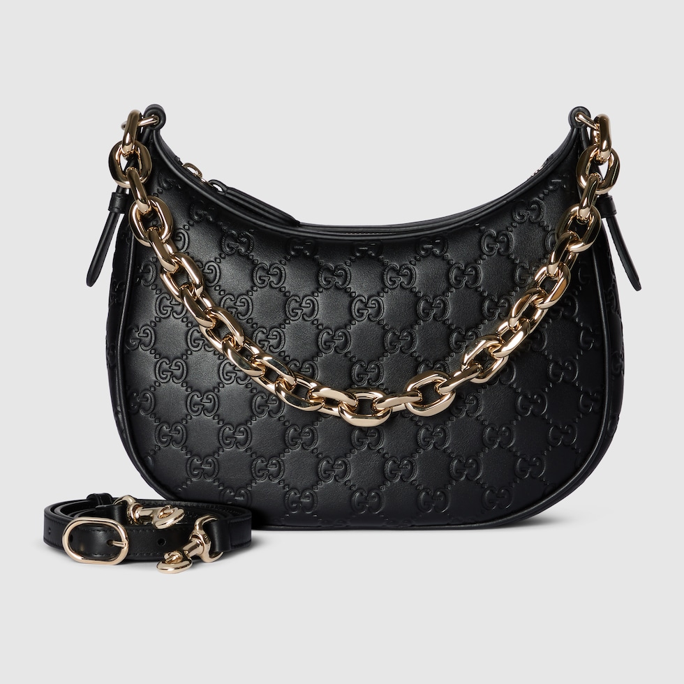 GG Emblem medium shoulder bag in black leather | GUCCI® US