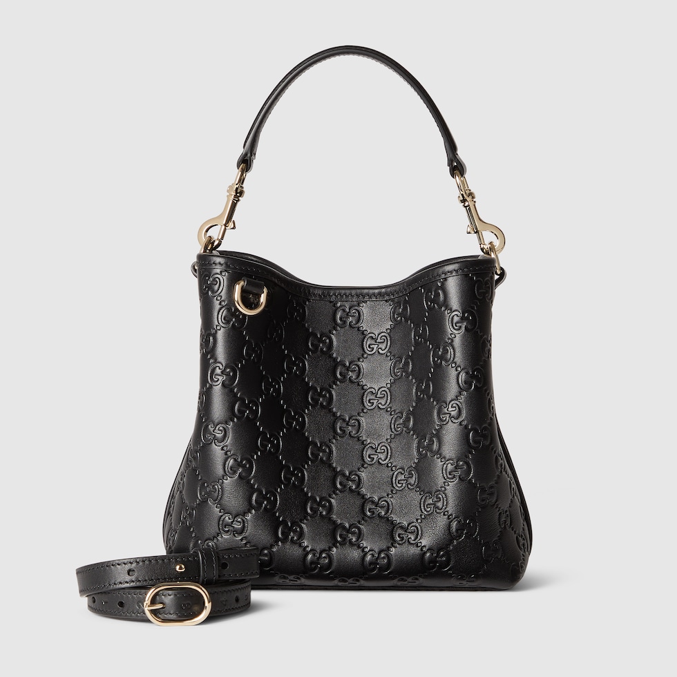 GG Emblem small bucket bag in black GG leather | GUCCI® US