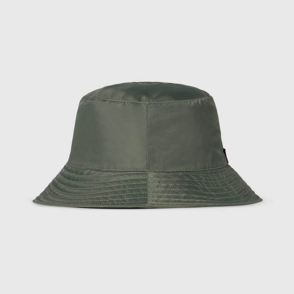 Reversible GG nylon bucket hat in dark green | GUCCI® US
