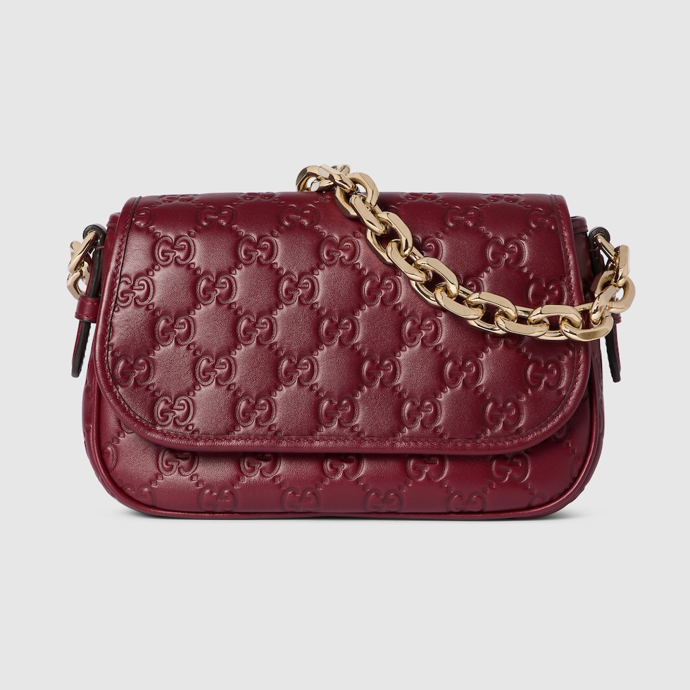 GG Emblem small shoulder bag in Rosso Ancora red GG leather