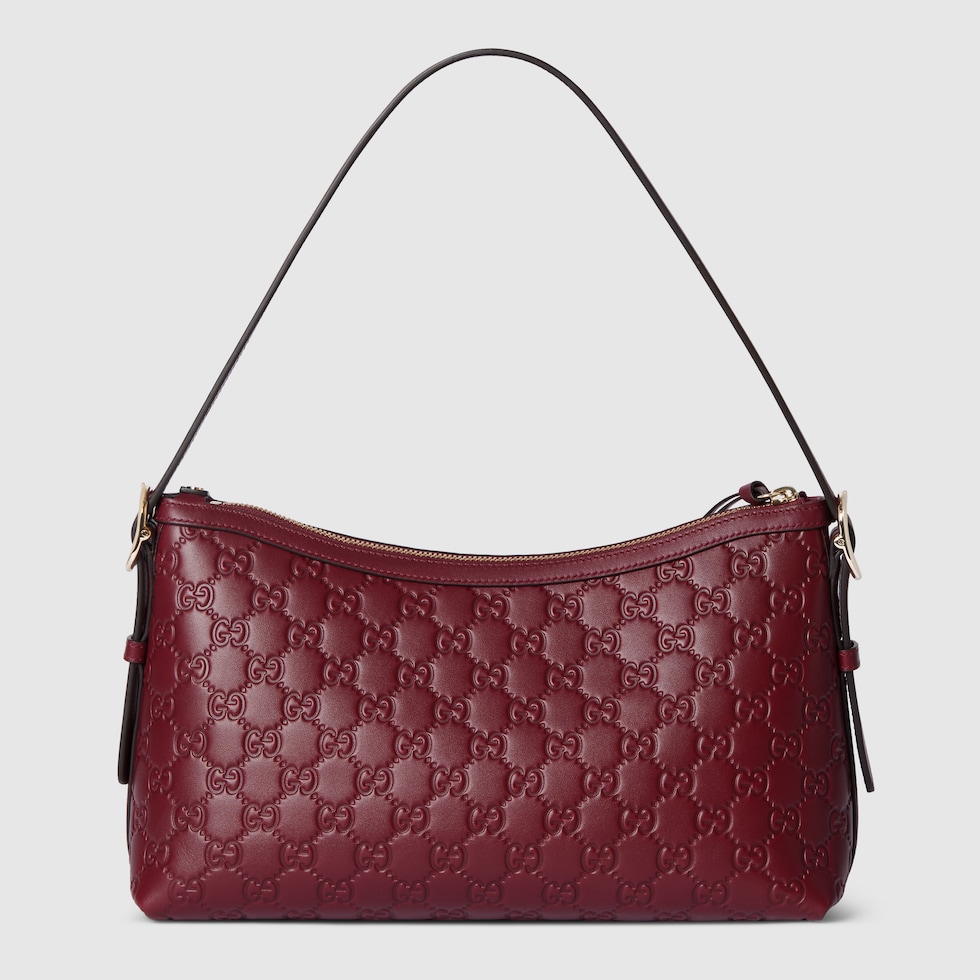 GG Emblem medium shoulder bag in Rosso Ancora red GG leather | GUCCI® UK