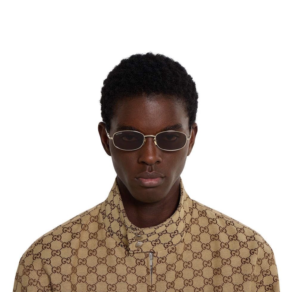 Oval frame sunglasses in light gold | GUCCI® US