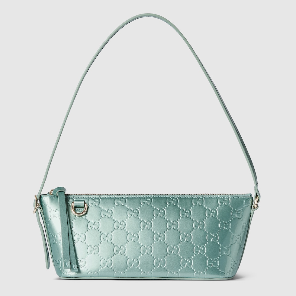 GG Emblem small shoulder bag in light blue GG leather | GUCCI® US