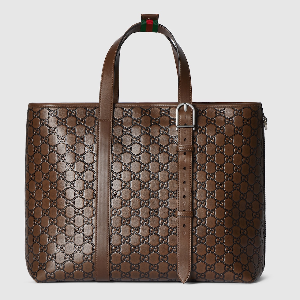 GG Emblem large tote bag in brown and black GG leather | GUCCI® US