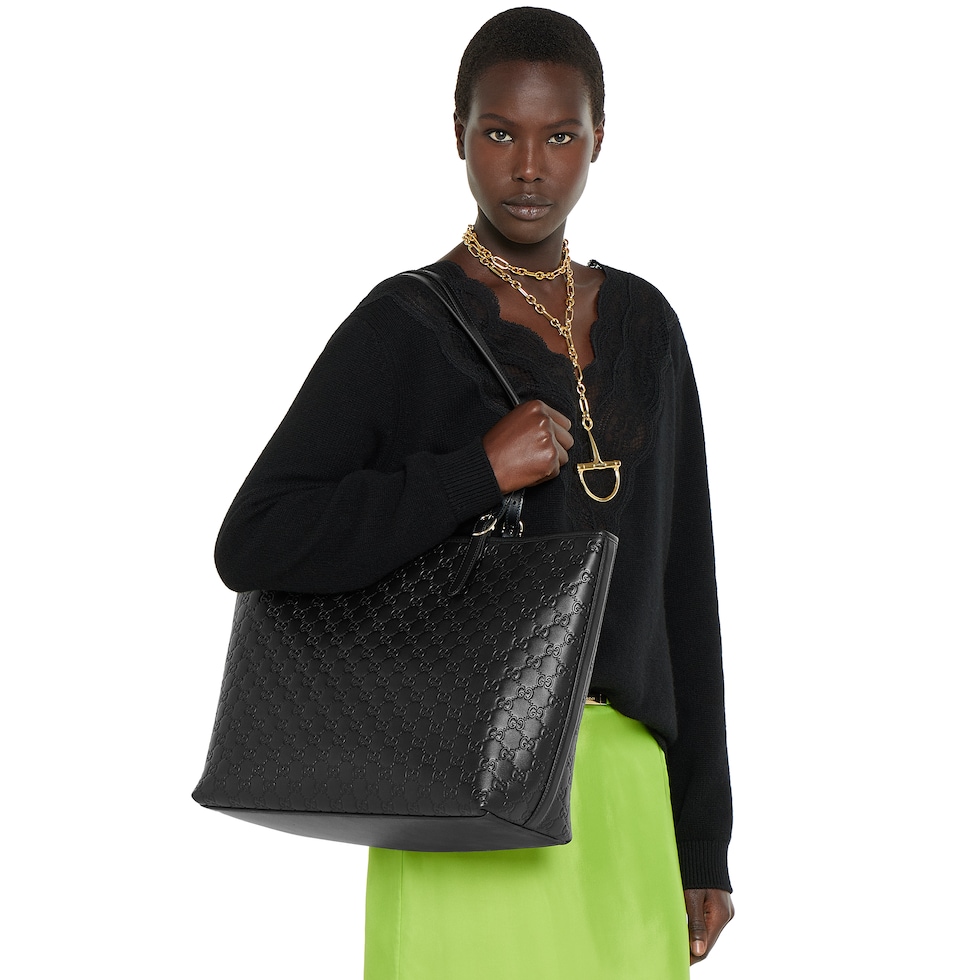 GG Emblem large tote bag in black GG leather | GUCCI® US