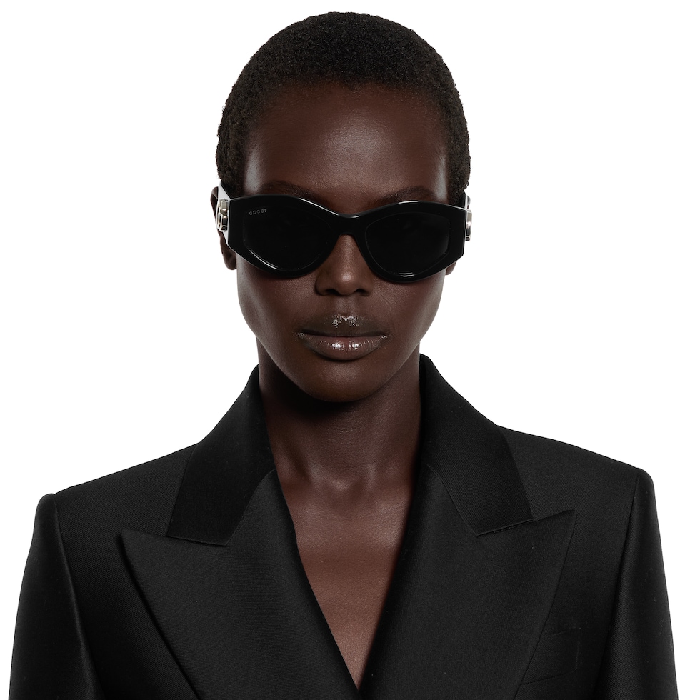 Oval frame sunglasses in black | GUCCI® US