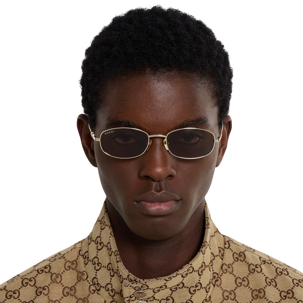 Oval frame sunglasses in light gold | GUCCI® US