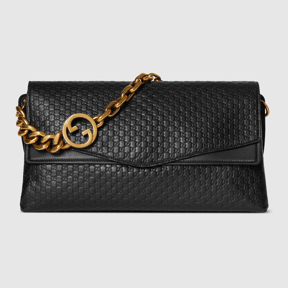 Large shoulder bag with chain in black GG leather | GUCCI® US