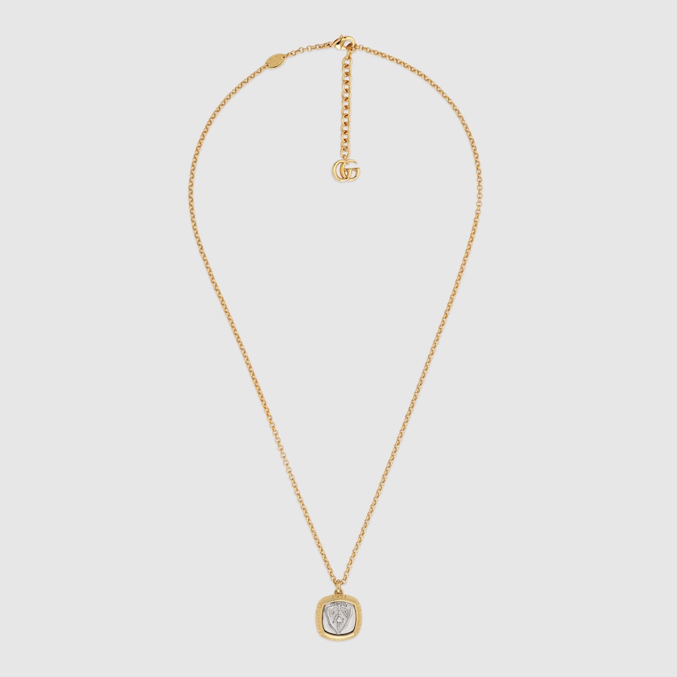 Gucci crest pendant necklace in gold-toned brass | GUCCI® GR