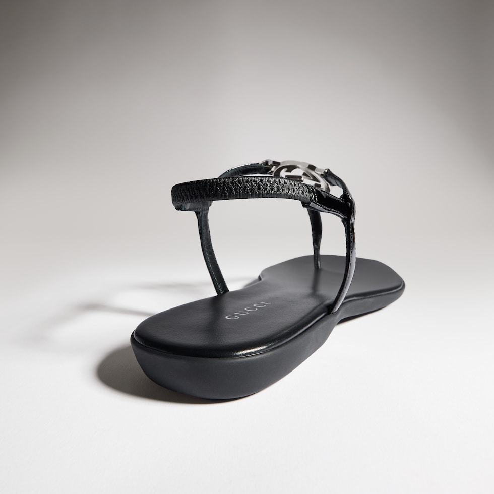 Women's thong sandal with Interlocking G in black patent leather