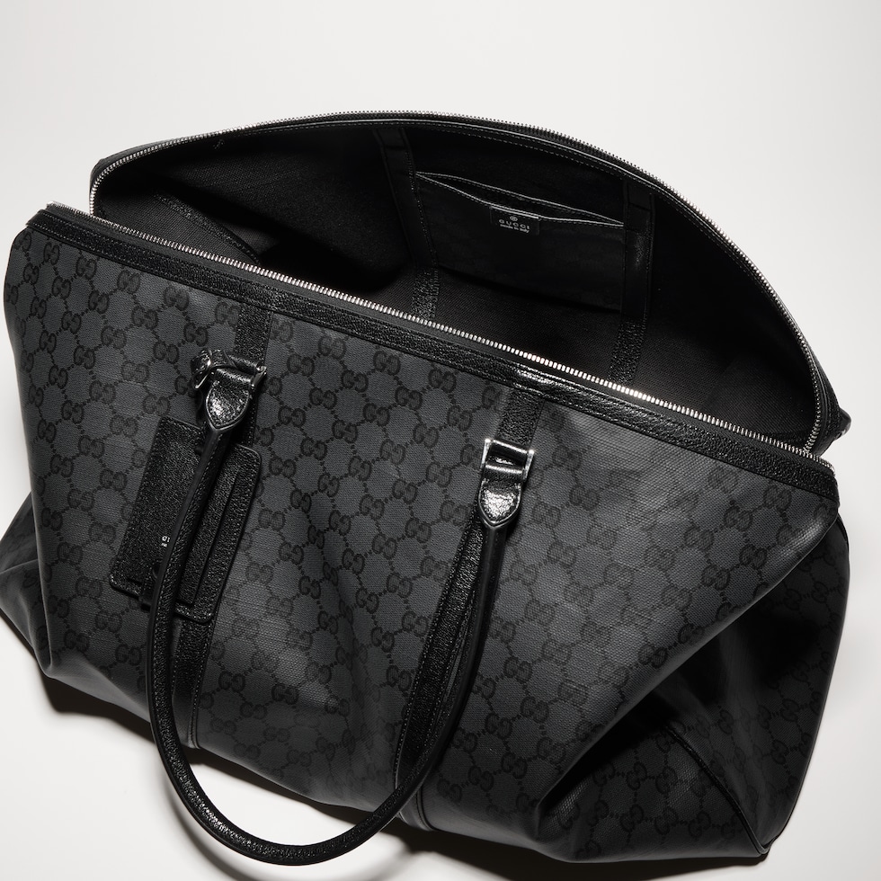 GUCCI ブラック ケープ Gucci Essence Classic large duffle bag in black GG canvas | GUCCI® US