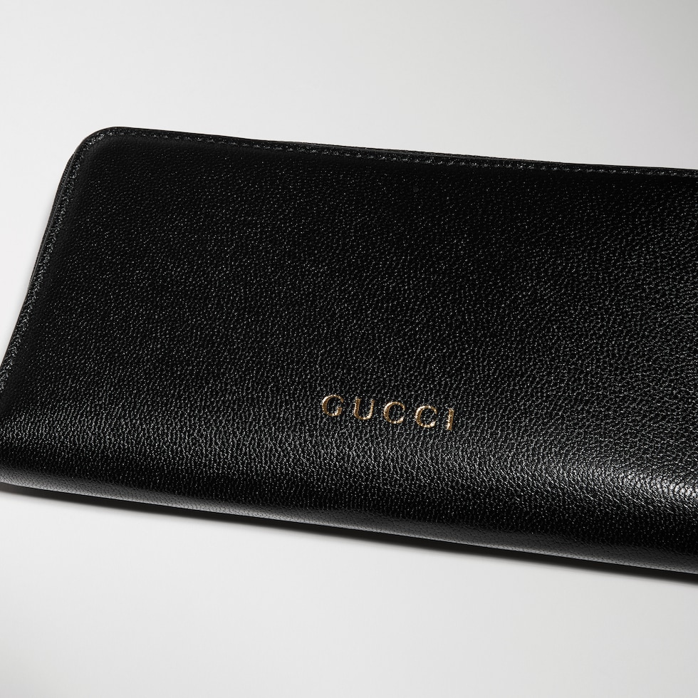 Brieftasche mit Rundumreißverschluss und Gucci Schriftzug in schwarzes ...