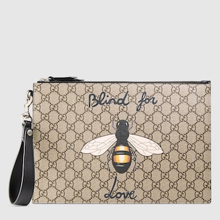 Bee print GG Supreme pouch