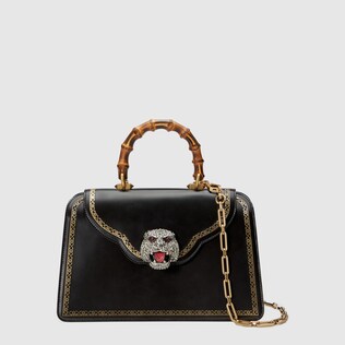 Frame print leather top handle bag