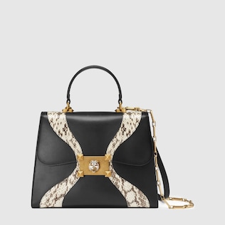 Leather and snakeskin top handle bag