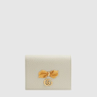 Leather card case with bow