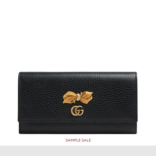 Leather continental wallet with bow